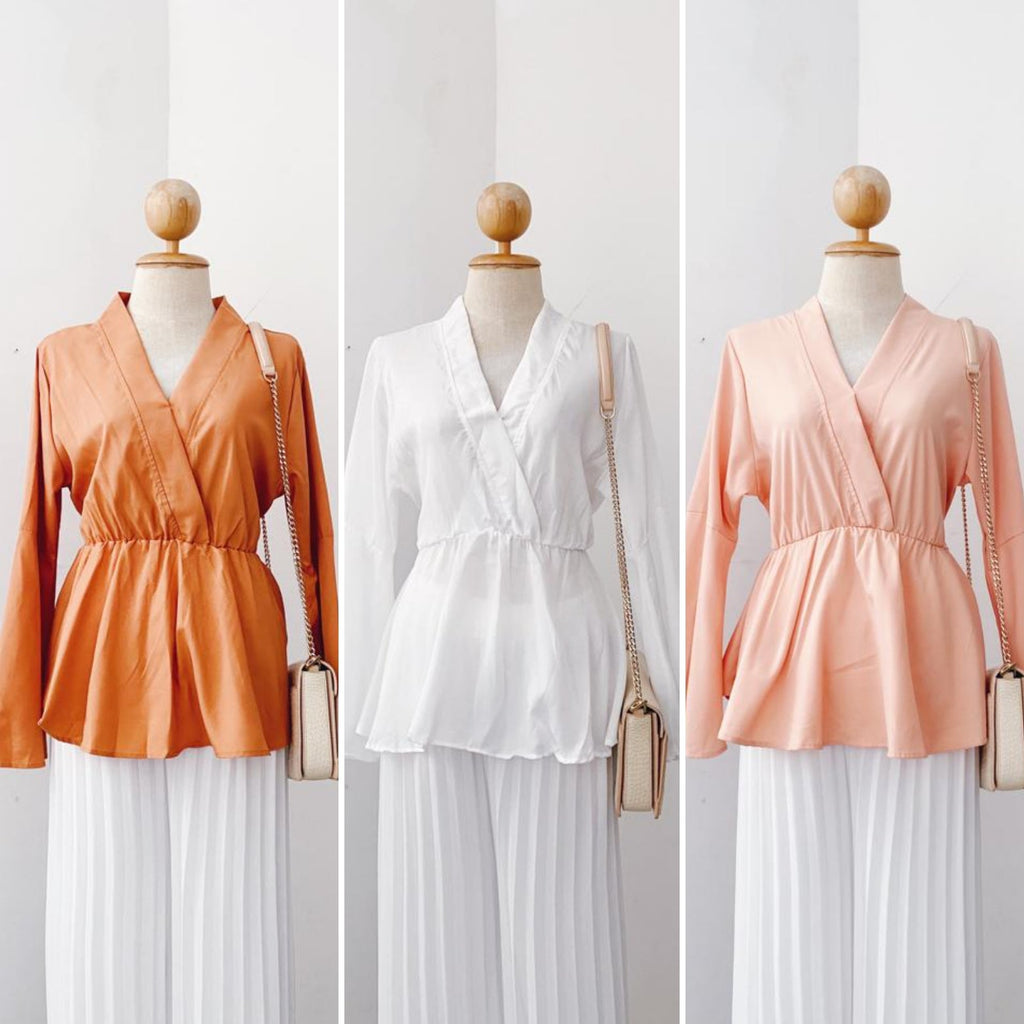 Bella Peplum Tops
Effortless elegance with modern functionality.